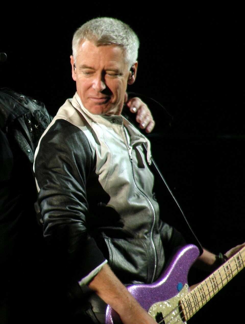 Adam Clayton, Chanteur